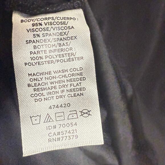 Ann Taylor Black Crewneck Long Sleeve Curve Hem Top Size XS - Picture 8 of 8